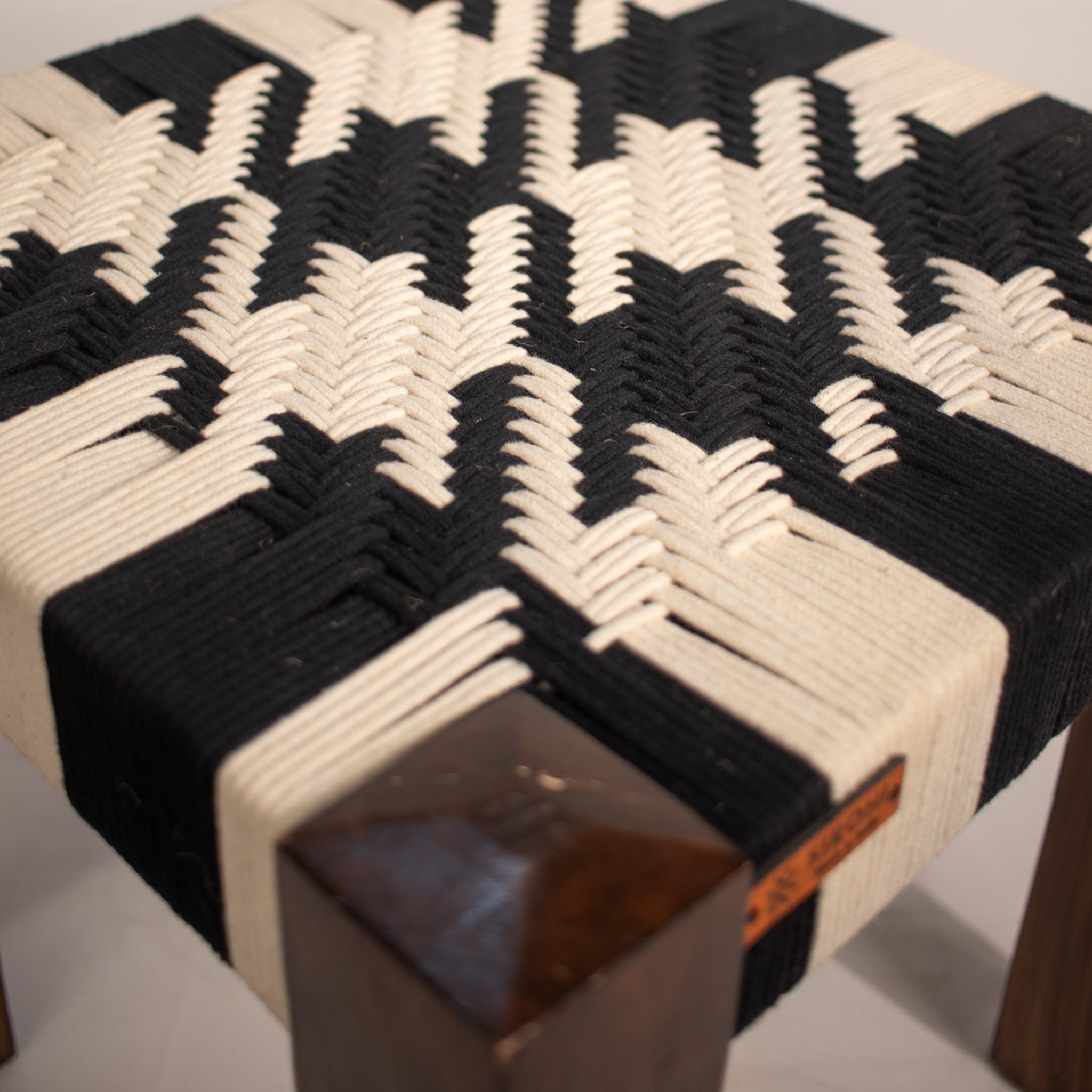 Black and white wooden stool