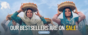 Three women carrying baskets on their heads with promotional text overlay.